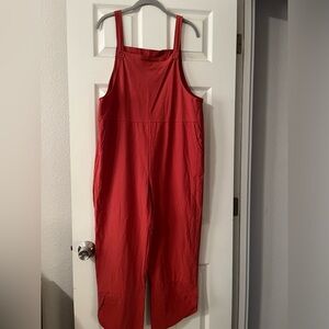 Bought at boutique. Never worn burnt orange color